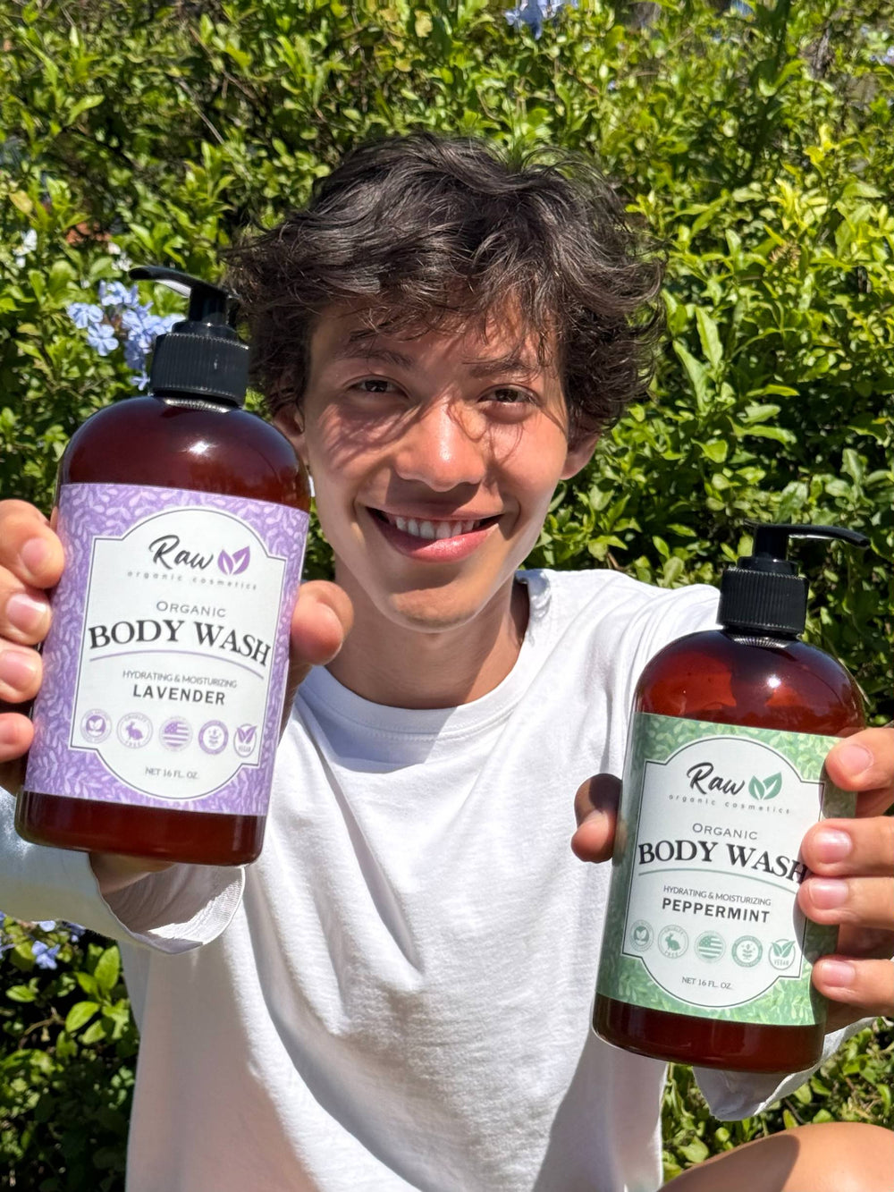 Young man enjoying Raw Organic Cosmetics lavender and peppermint organic body wash, experiencing its refreshing and soothing benefits for clean, nourished skin
